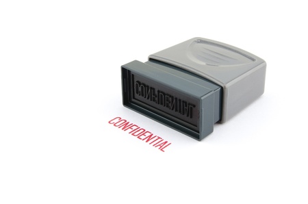Confidential Rubberstamp on white backgroundの写真素材