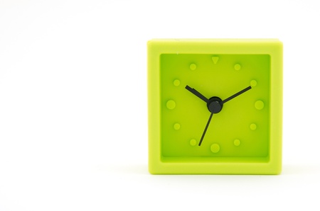 Green Clock on White Backgroundの写真素材