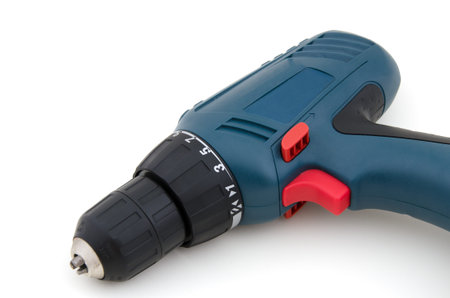 Battery-powered electric drill on white background 