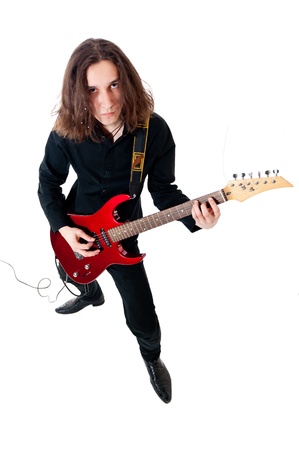 Young guitarist with red guitar on white backgroundの写真素材