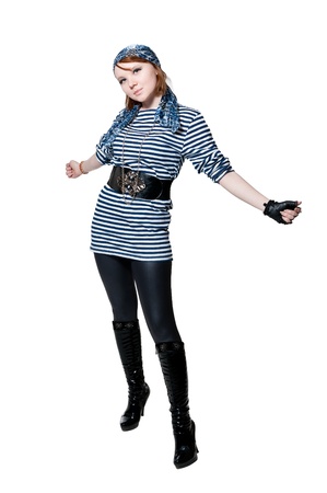 the beautiful girl dressed as the pirate isolated on white backgroundの写真素材