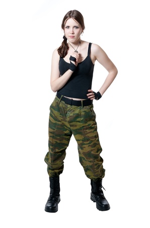 girl in a military uniform isolated on whiteの写真素材