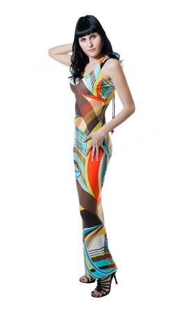 girl in abstract colored dress isolated on whiteの写真素材