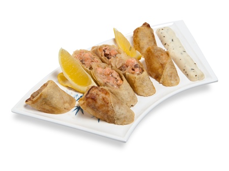 spring roll on plate isolated on whiteの写真素材