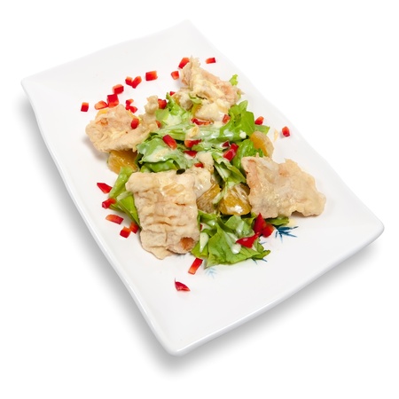 salad with salmon tempura isolated on white backgroundの写真素材