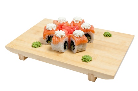 sushi on wooden stand isolated on white backgroundの写真素材