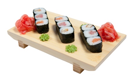 sushi on wooden stand isolated on white backgroundの写真素材