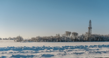 Winter landscape. Drilling rig for the snow-covered forestの写真素材
