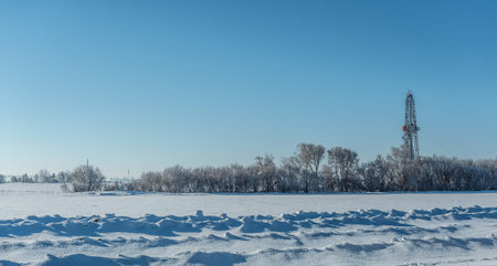 Winter landscape. Drilling rig for the snow-covered forestの写真素材
