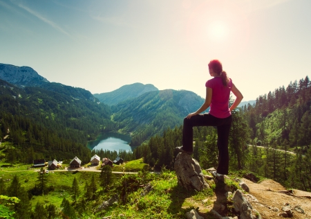 Large panorama with girl on the top of the hillの写真素材