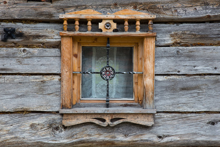 Wooden window in the wooden old houseの写真素材