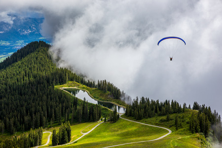 Parachuting in high mountains Alps Austria Europeの写真素材