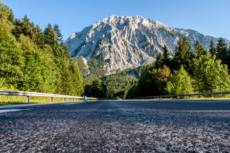 The walk with umbrella in the mountainsの写真素材