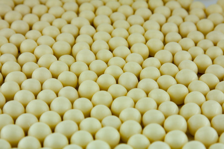 Many of white tasty yummy chocolate dropsの写真素材