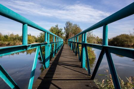 Old traditional bridge over the small pondの写真素材