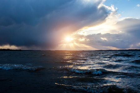 Beautiful sunset over the lake in summerの写真素材