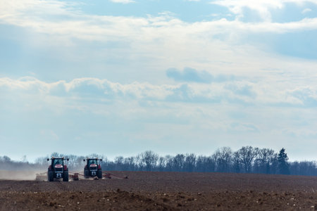 The tractor working on the large field
