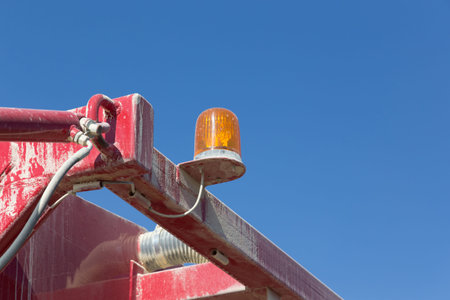 Alarm lamp on the red big tractor