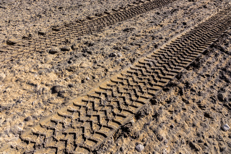 The traces of the tractor working on the large fieldの写真素材