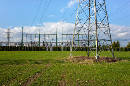 The powerlines on the large green field