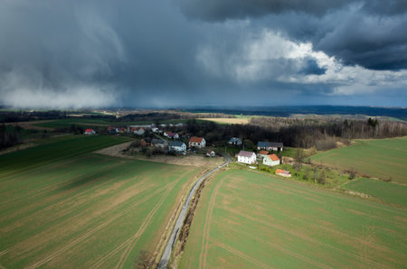 Aerial view of the storm over the big large fieldの写真素材