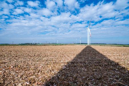 Close view on the windmill on the field