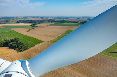 Aerial view on the windmills on the fieldの写真素材