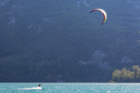 view on the kiteboarder on the lake