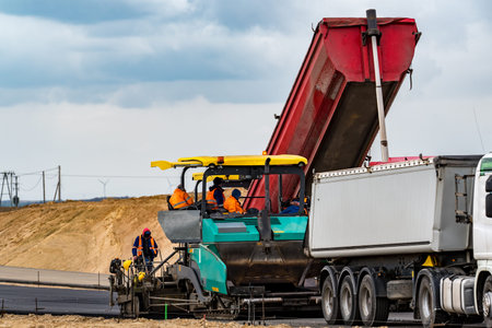 Road roller building the new asphalt road