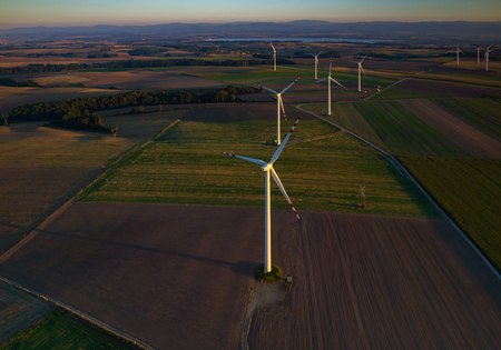 Large view on the windmills on the fieldの写真素材