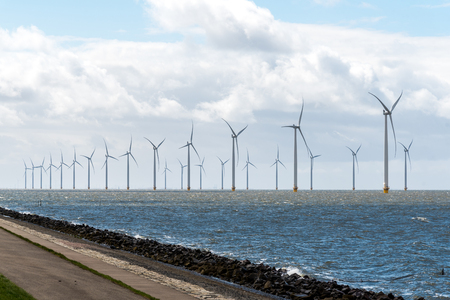 Large view on the windmills in the oceanの写真素材