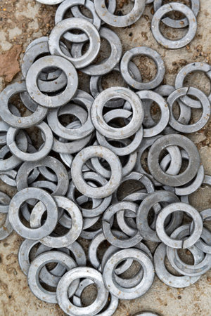 Close view on the stack of screw nuts