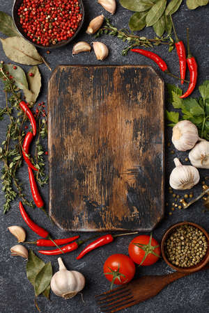 Frame composition made of vegetables and herbs with cutting boardの写真素材