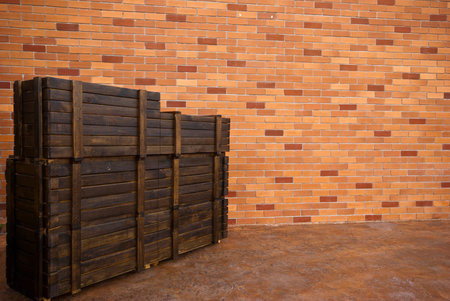 modern brick wall background with old wooden  boxes