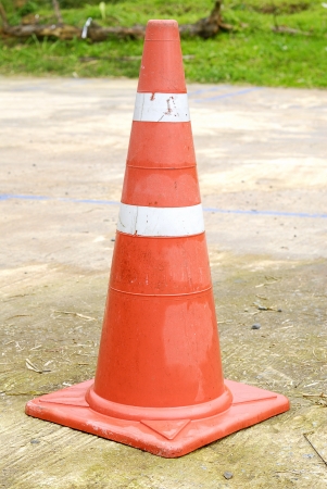 traffic cone - a orange road cone - orange traffic cone placed in road - Rubber coneの写真素材