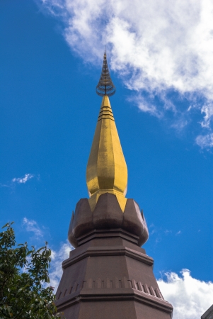 Top of pagoda against blue skyの写真素材