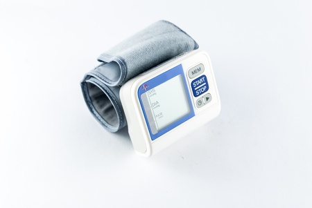 Blood pressure meter medical equipment isolated on white - Digital blood pressure meter - Arm Blood pressure checking -Two digital tonometerの写真素材