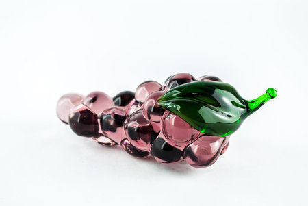Gems arranged in the form of grapes on white background - grape cluster - close-up jewelry isolatedの写真素材