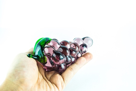 Gems arranged in the form of grapes on white background - grape cluster - close-up jewelry isolatedの写真素材