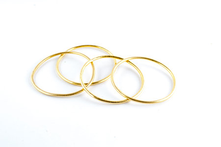 golden bracelets - bracelets isolated on the white background
