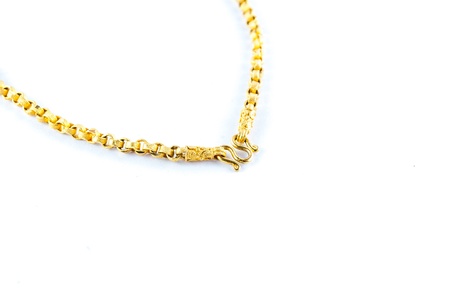 Golden chain isolated on white backgroundの写真素材