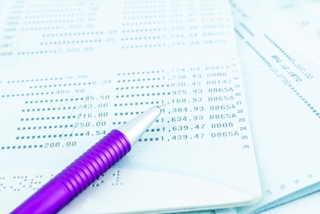 Close up of pen point out a personal banking bookの写真素材