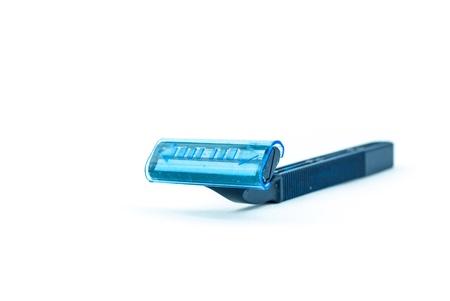 Blue using razor isolate on white background - Using shaving razor isolated on a white background - Shaver or Razor on the backgroundの写真素材