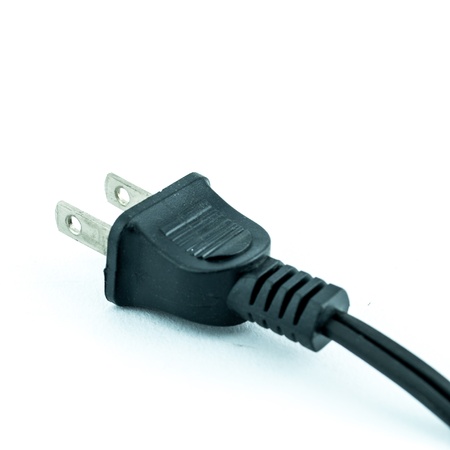 Electric plug - power plug - Black electric cable isolated on whiteの写真素材
