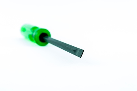 A green screw driver isolated on white backgroundの写真素材