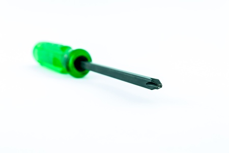 A green screw driver isolated on white backgroundの写真素材