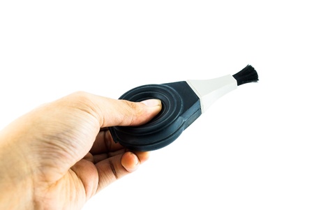 Blower brush isolated at the white background - Blower brush for cleaning lenses and cameras - black brush for photo cameraの写真素材