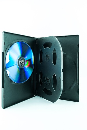Black Case for DVD Or CD Disk with DVD Or CD Disk isolated on white background - the CD in the package - Black compact diskの写真素材