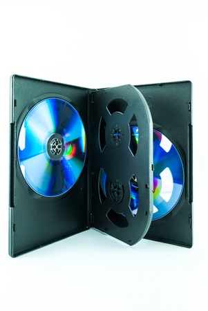 Black Case for DVD Or CD Disk with DVD Or CD Disk isolated on white background - the CD in the package - Black compact diskの写真素材