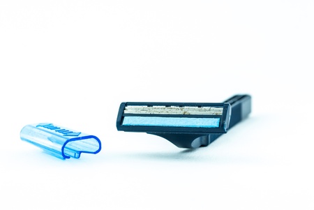 Blue using razor isolate on white background - Using shaving razor isolated on a white background - Shaver or Razor on the backgroundの写真素材